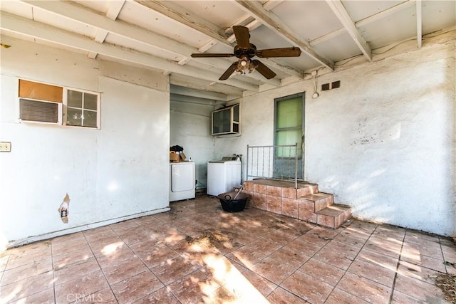 view of patio / terrace with ceiling fan and washing machine and dryer