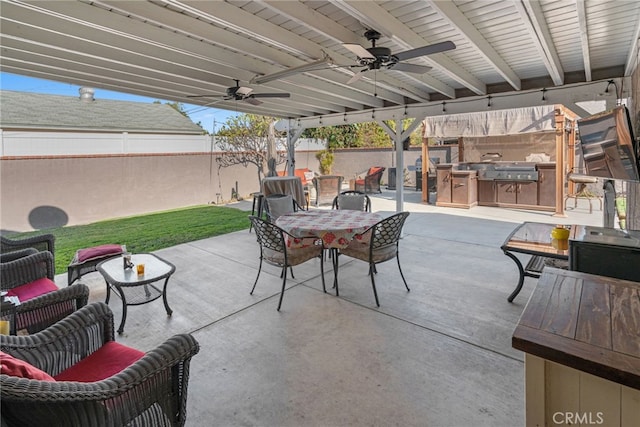 view of patio / terrace featuring grilling area, area for grilling, and ceiling fan