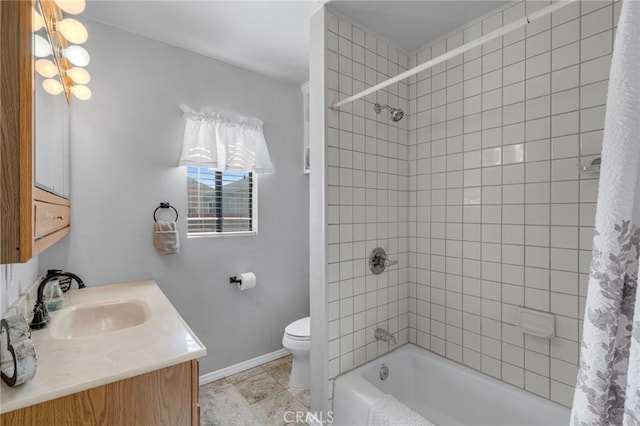 full bathroom featuring shower / bath combination with curtain, vanity, and toilet