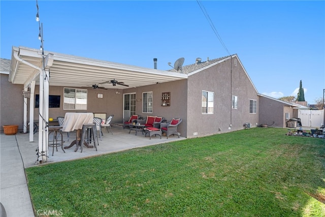 rear view of property with ceiling fan, a yard, outdoor lounge area, and a patio