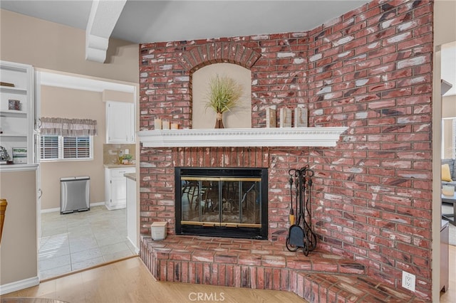 details with a fireplace and hardwood / wood-style floors