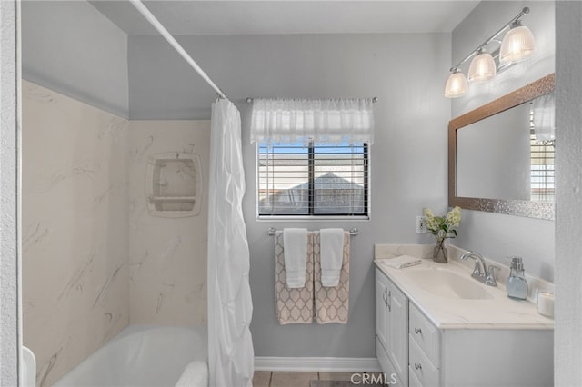 bathroom featuring vanity and shower / tub combo with curtain