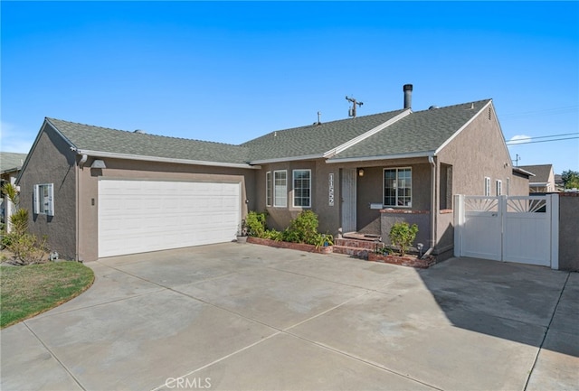 single story home featuring a garage