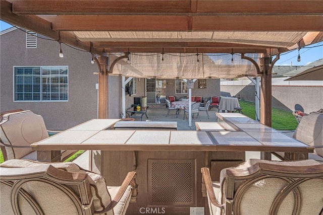 view of patio featuring a bar