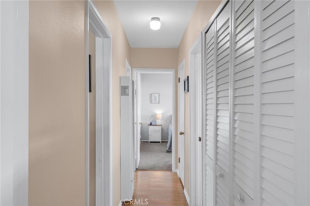 hallway featuring light wood-type flooring