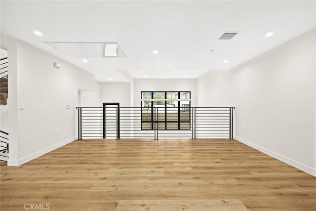 empty room with light wood-type flooring