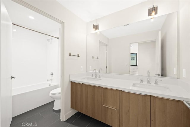 full bathroom featuring bathtub / shower combination, tile patterned floors, toilet, and vanity