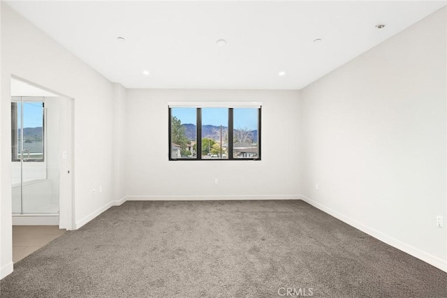 empty room with carpet flooring