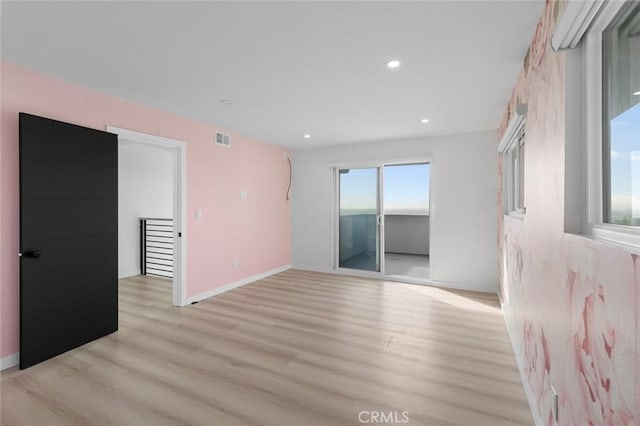 empty room featuring light wood-type flooring