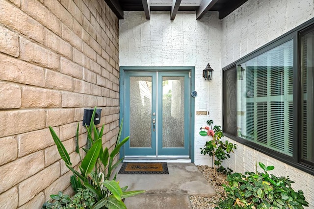 doorway to property featuring french doors