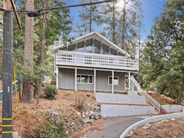 view of property featuring a wooden deck