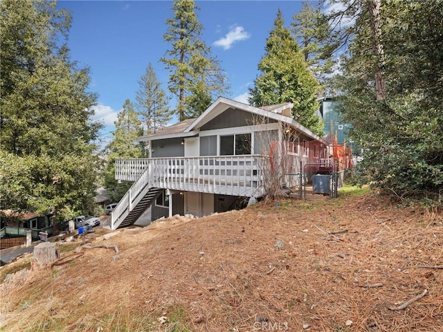 view of front facade featuring a wooden deck