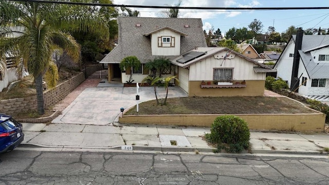 view of front of property with solar panels