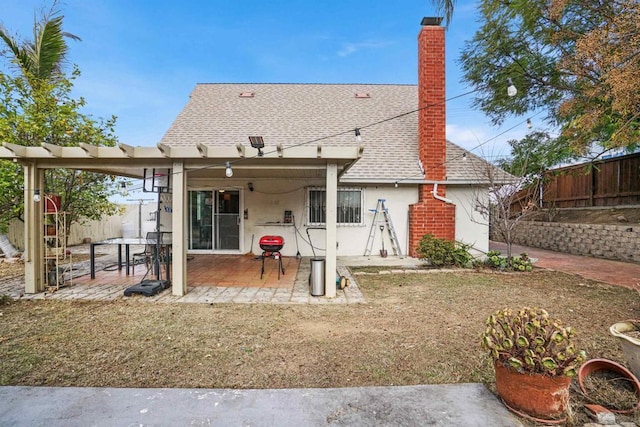 back of property featuring a patio area