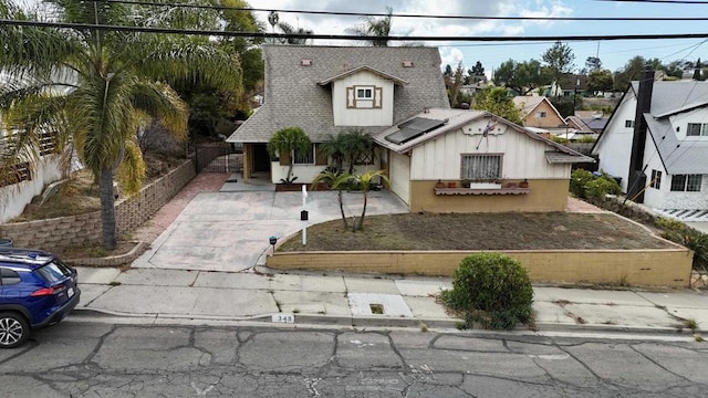 view of front of home featuring solar panels