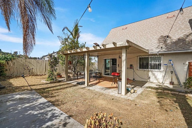 back of house with a patio