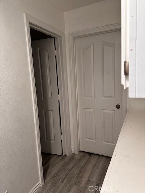 hall featuring dark hardwood / wood-style flooring