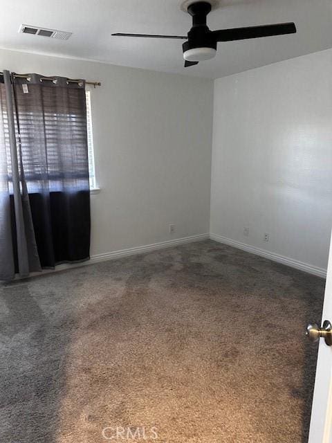 unfurnished room featuring carpet floors and ceiling fan