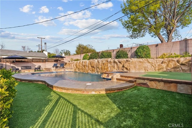 view of yard with a fenced in pool