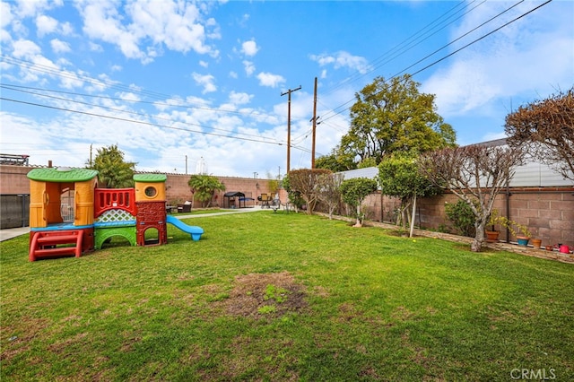 view of yard featuring a playground