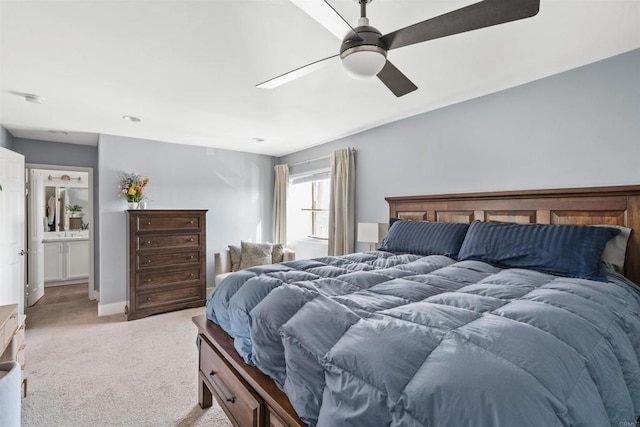 carpeted bedroom featuring ceiling fan