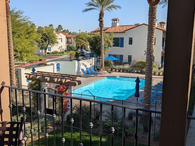 view of swimming pool featuring a patio