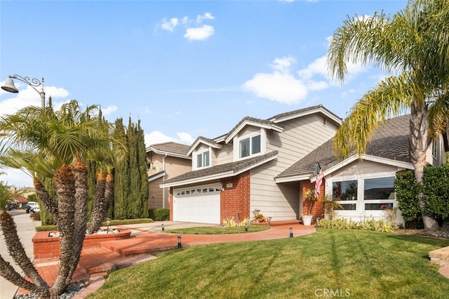 view of front of home featuring a garage and a front yard