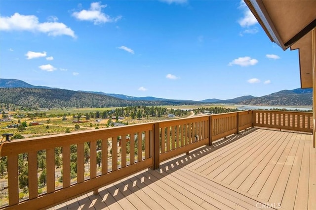 wooden terrace featuring a mountain view