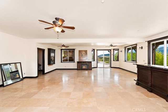 unfurnished living room featuring a fireplace