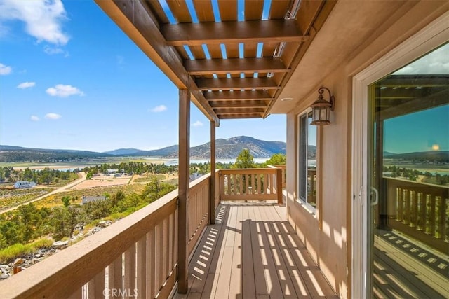 balcony featuring a mountain view