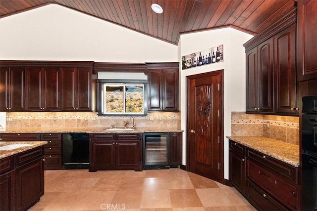 kitchen with lofted ceiling, beverage cooler, dishwasher, and sink