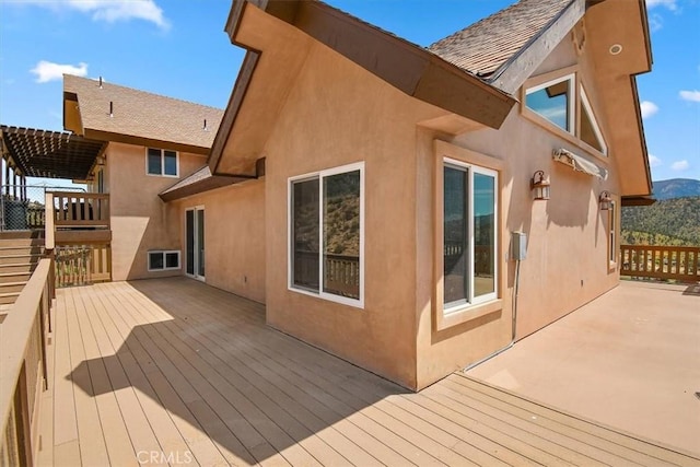 deck featuring a pergola