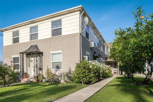 view of front of house with a front yard