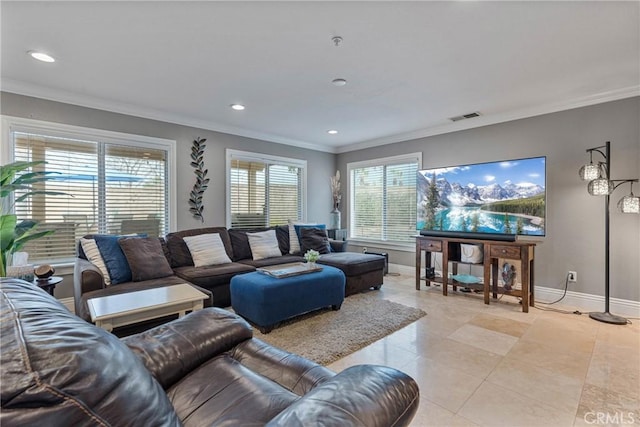 living room with ornamental molding, light tile patterned floors, and plenty of natural light