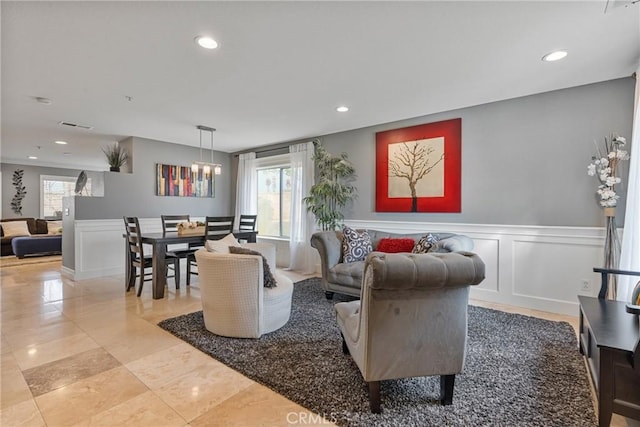 living room featuring plenty of natural light