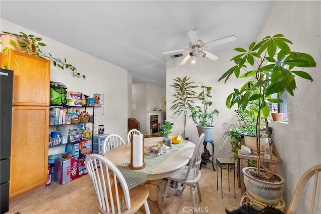 dining room with ceiling fan