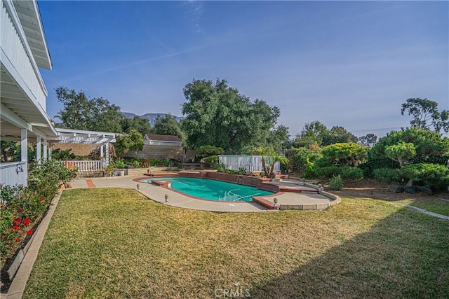 view of swimming pool with a yard, a pergola, and a patio area