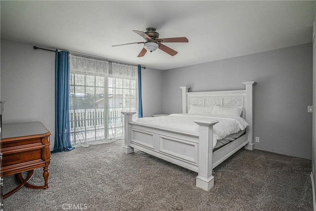 carpeted bedroom with access to exterior and ceiling fan