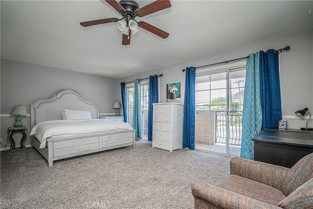 carpeted bedroom featuring ceiling fan, multiple windows, and access to outside