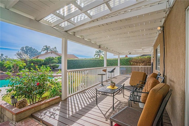 wooden terrace featuring a pergola