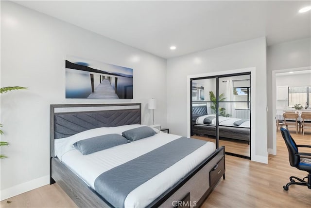 bedroom featuring light wood-type flooring