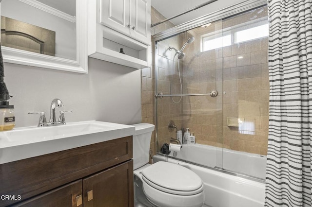 full bathroom featuring ornamental molding, vanity, toilet, and combined bath / shower with glass door