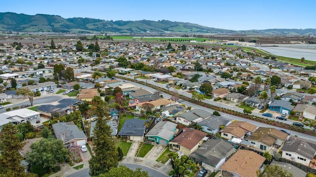 aerial view with a water and mountain view