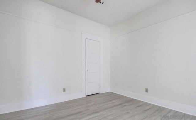 unfurnished room featuring light hardwood / wood-style flooring