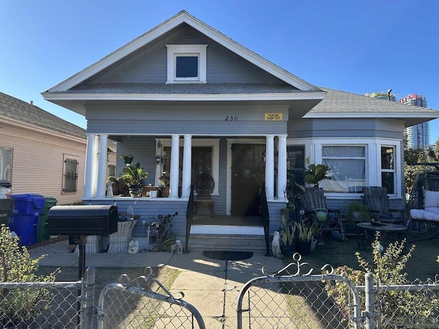 back of property featuring a porch