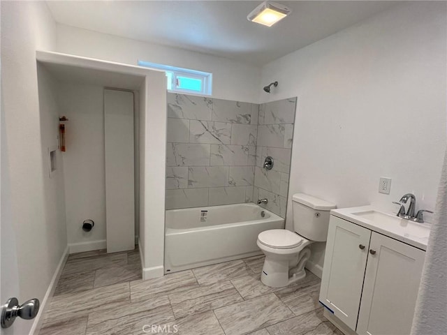 full bathroom with vanity, toilet, and tiled shower / bath combo