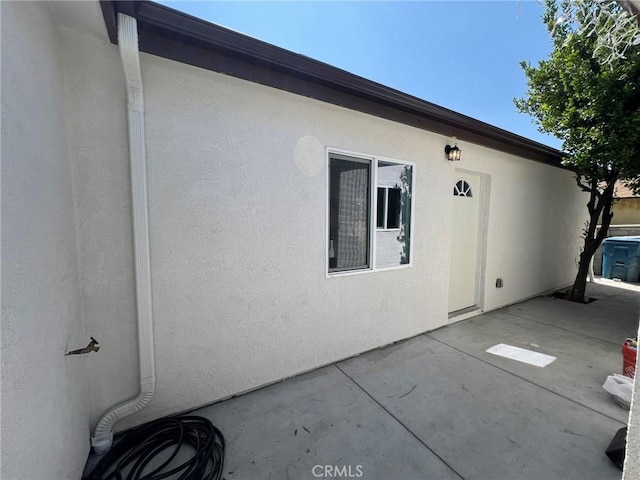 view of home's exterior with a patio