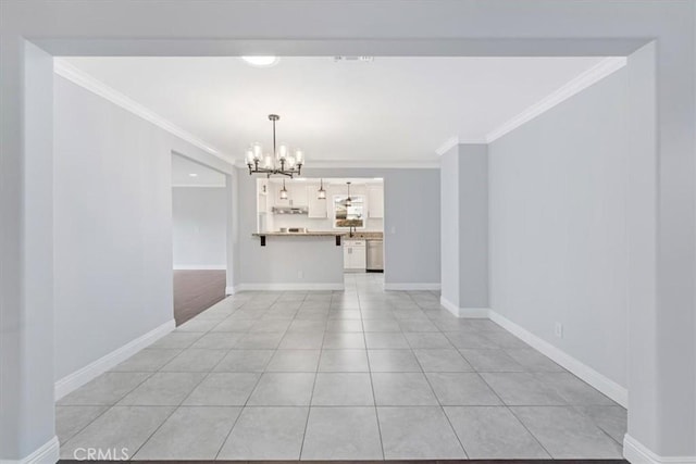 interior space with light tile patterned floors, crown molding, and a chandelier