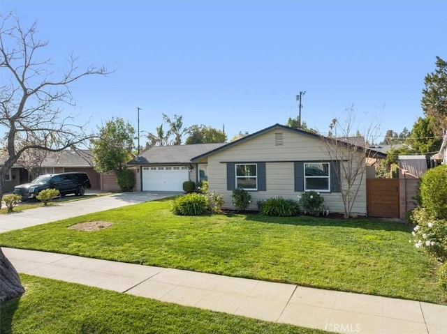 ranch-style home with a garage and a front yard