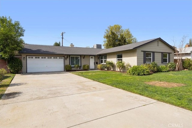 single story home featuring a garage and a front yard